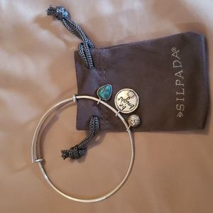 Silpada Sterling Silver bracelet with charms.